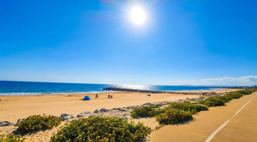 A peaceful afternoon walk along the golden sands of Costa da Caparica, a perfect slow travel activity to include in a 3 day Lisbon itinerary.