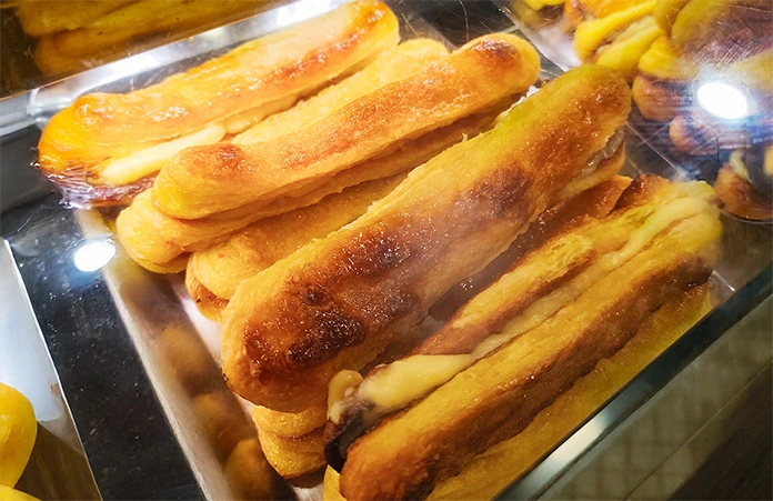 The famous Os Claudinos pastry from O Caporte in Costa da Caparica, a must-try local secret for anyone looking for authentic Portuguese food.